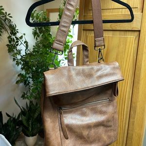 Tan backpack can use it 2 ways